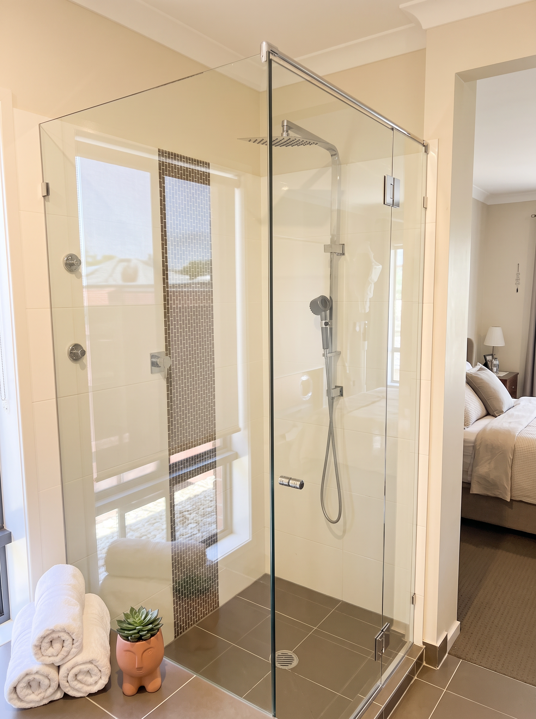 Ensuite Shower Screens — Frameless shower screen · Corner return · Polished chrome hardware
